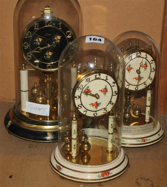 3 clocks under domes